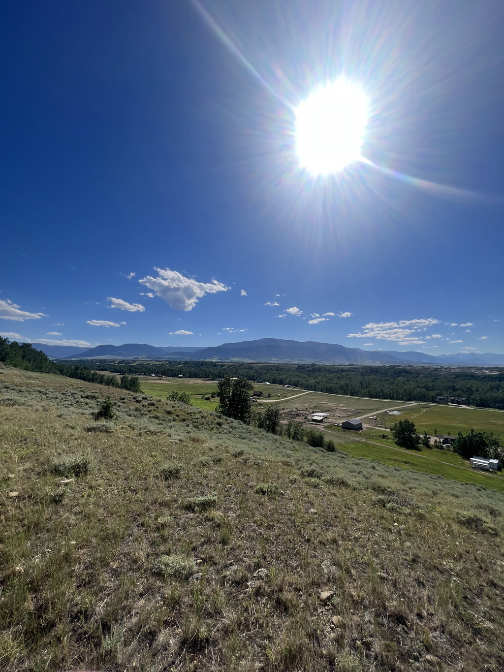 The Bench: afternoon light across the valley at East Bench Overlook near Red Lodge, Montana