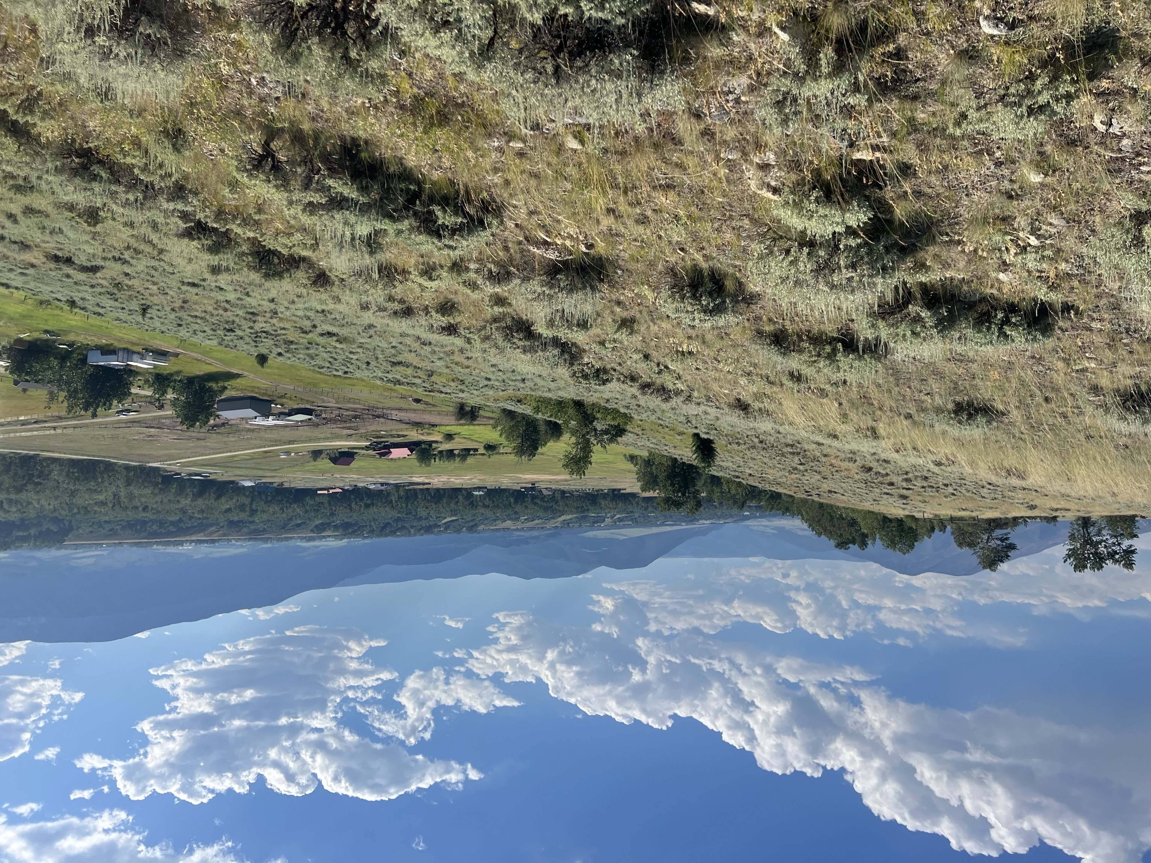 Wide valley with sagebrush and mountains on the east bench above Red Lodge