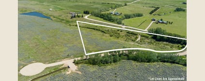 Aerial view of Lot 1 at East Bench Overlook with approximate boundary outline, pond and cul-de-sac nearby