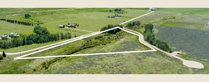 Aerial view of Lot 1 with approximate boundary outline along the subdivision entry
