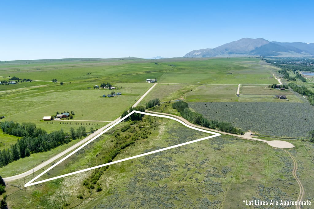 Aerial view of Lot 1 at East Bench Overlook with the Beartooth Front beyond