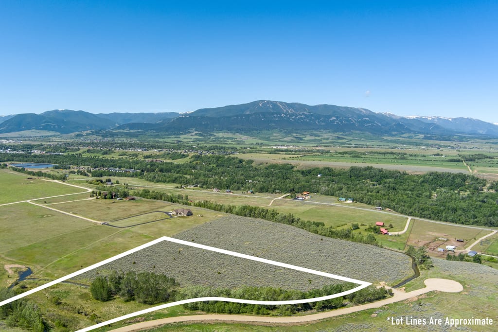 The valley, a pond, and the mountain range to the west of Lot 2