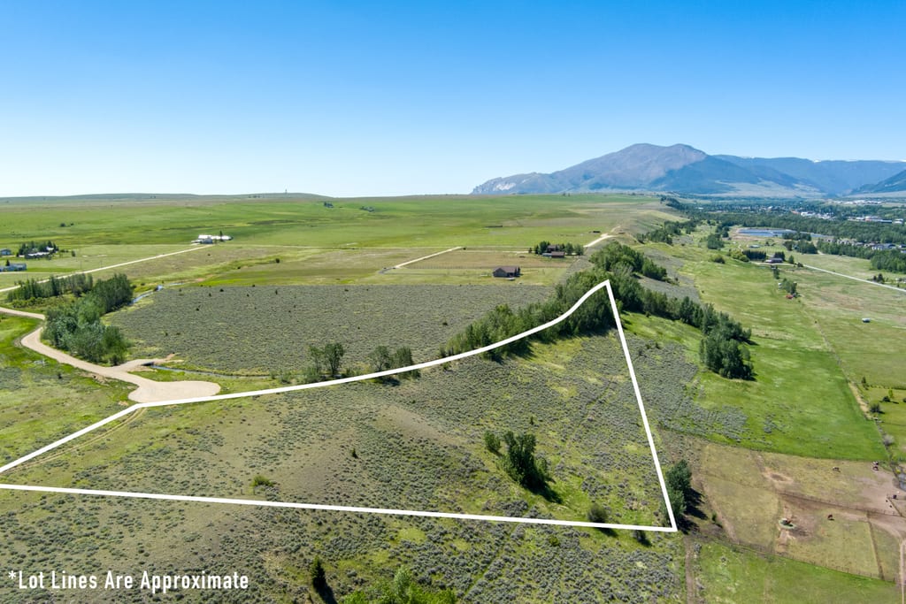 Aerial view of Lot 4 at East Bench Overlook with the Beartooth Front beyond