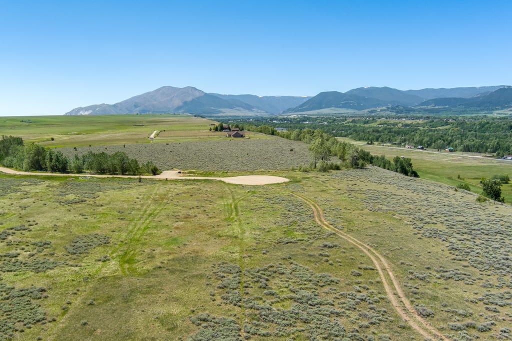 Sage and grass on Lot 5 running toward the mountains