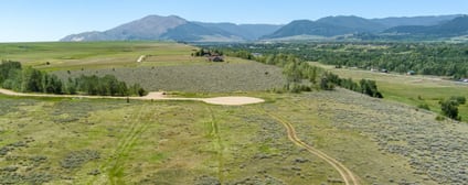 Sage and grass on Lot 5 running toward the mountains