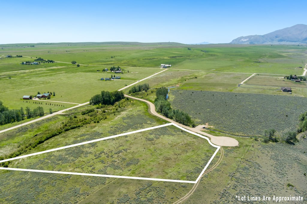 Aerial view of Lot 5 with approximate boundary outline, cul-de-sac at its corner