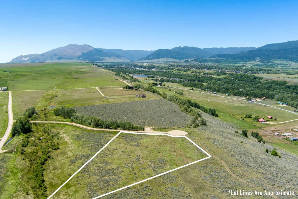 Aerial view of Lot 5 with approximate boundary outline along the canal side