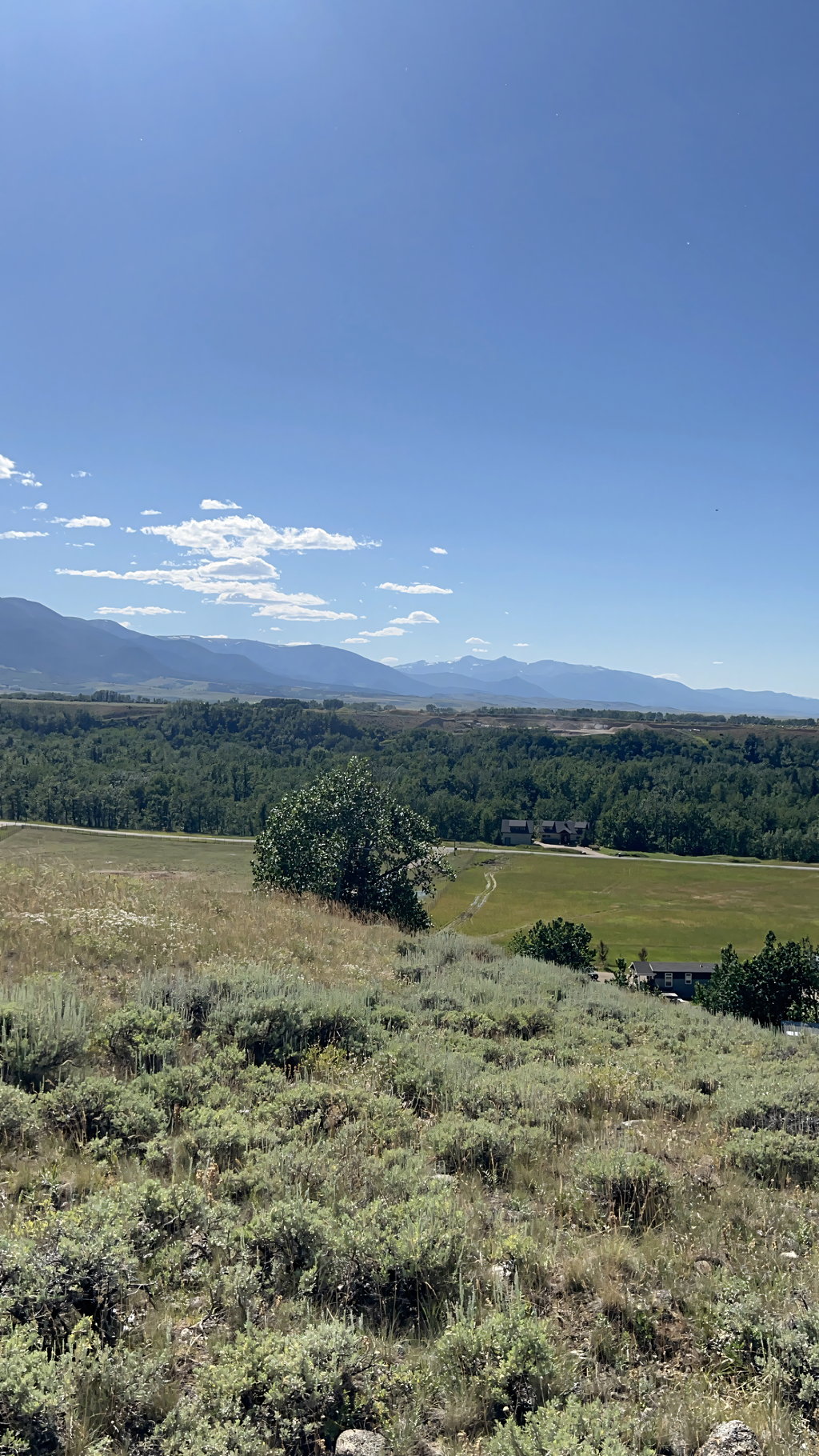 Valley and mountain panorama from Lot 2 at East Bench Overlook